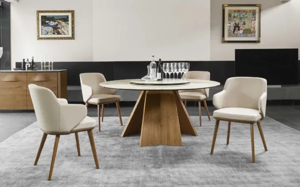 Tavolo rotondo con piano in ceramica e basamento in legno Icaro di Calligaris