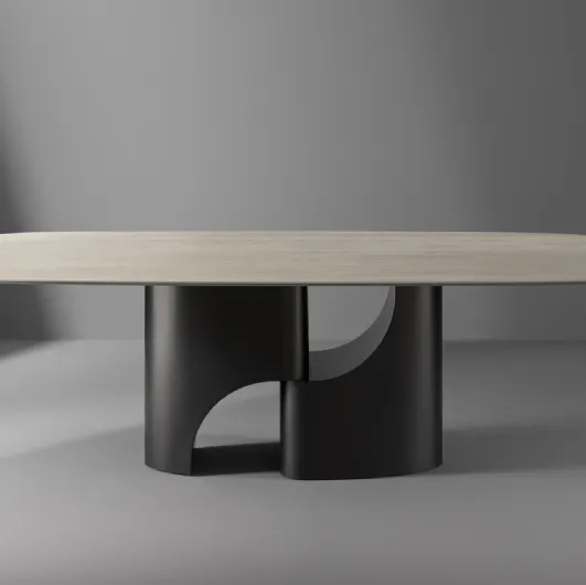 Tavolo Taijitu con piano in marmo e base in metallo di Bonaldo