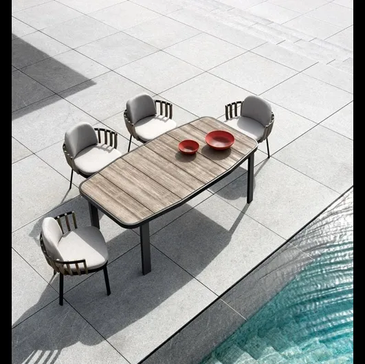 Poltroncina Swing in Teak e alluminio di Ethimo